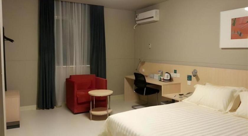 Jinjiang International Tourism And Zone Zhoupu Zhouzhu Highway Branch Hotel