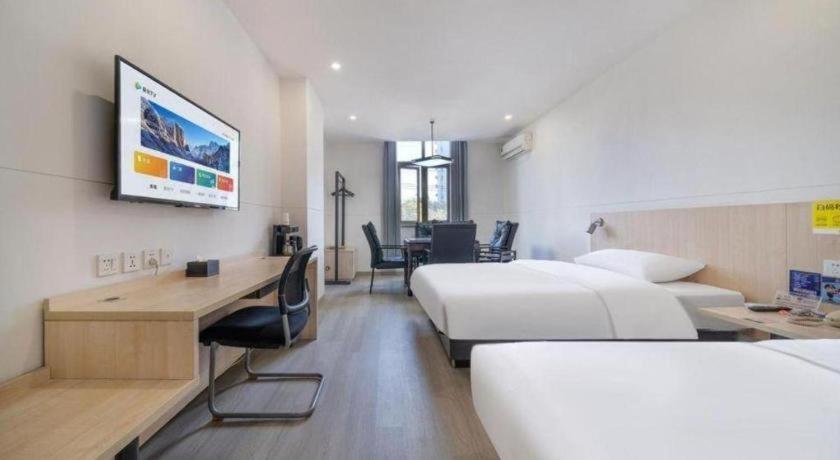 Jinjiang International Tourism And Zone Zhoupu Zhouzhu Highway Branch Hotel